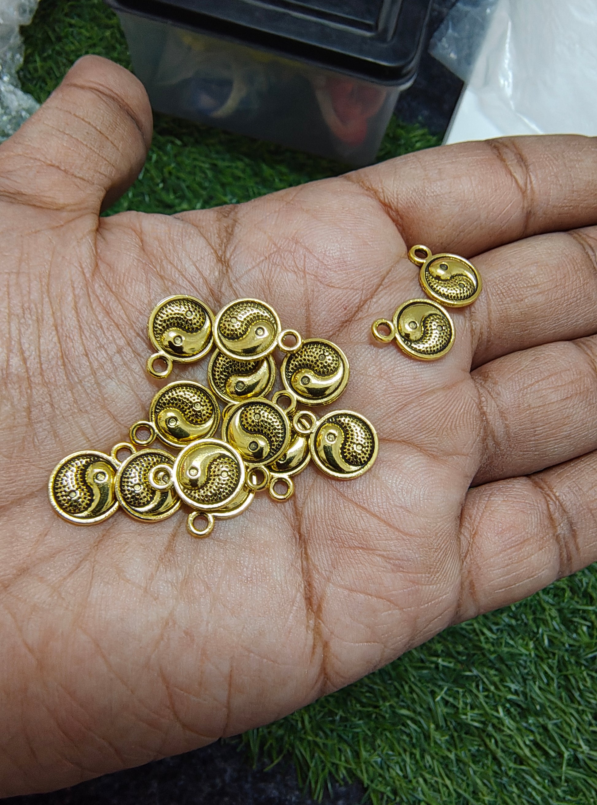 Small golden metal charm 9 design