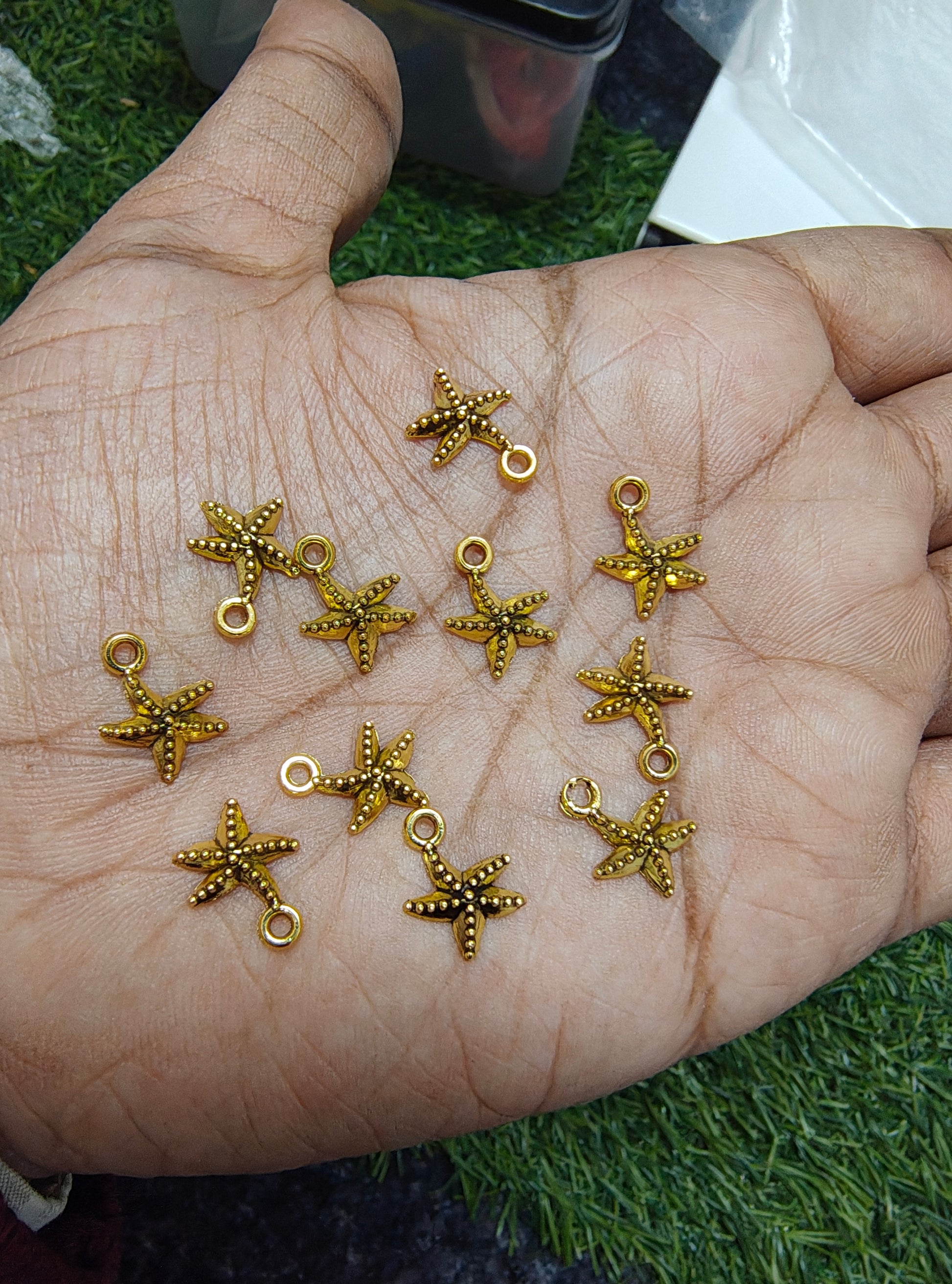 Small golden metal charm 9 design