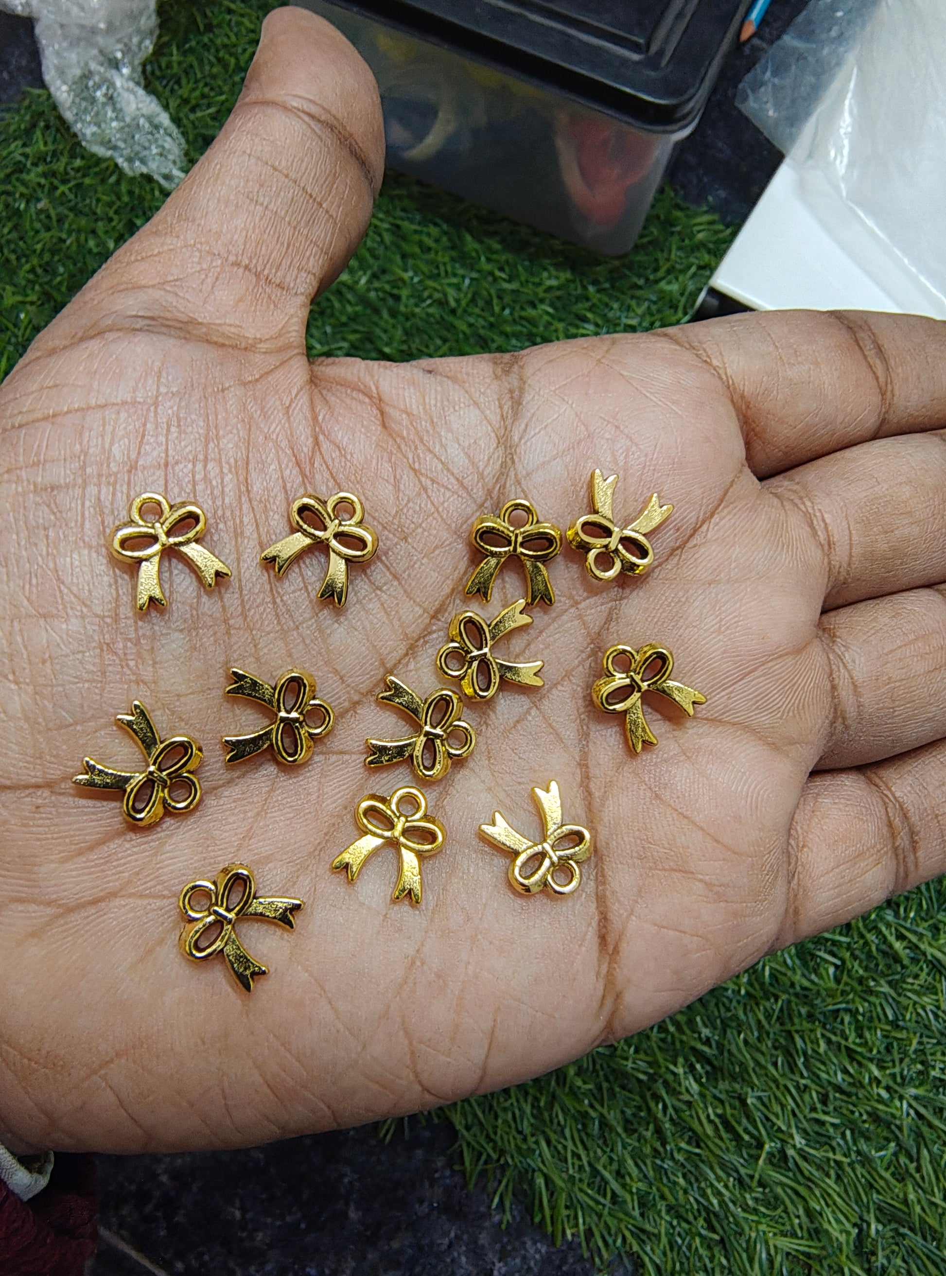 Small golden metal charm 9 design