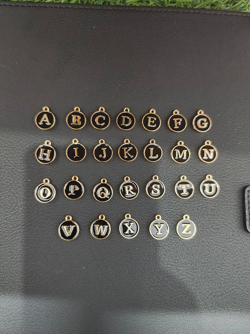 Round black alphabet charm ( atoz set) ( EC1096 )