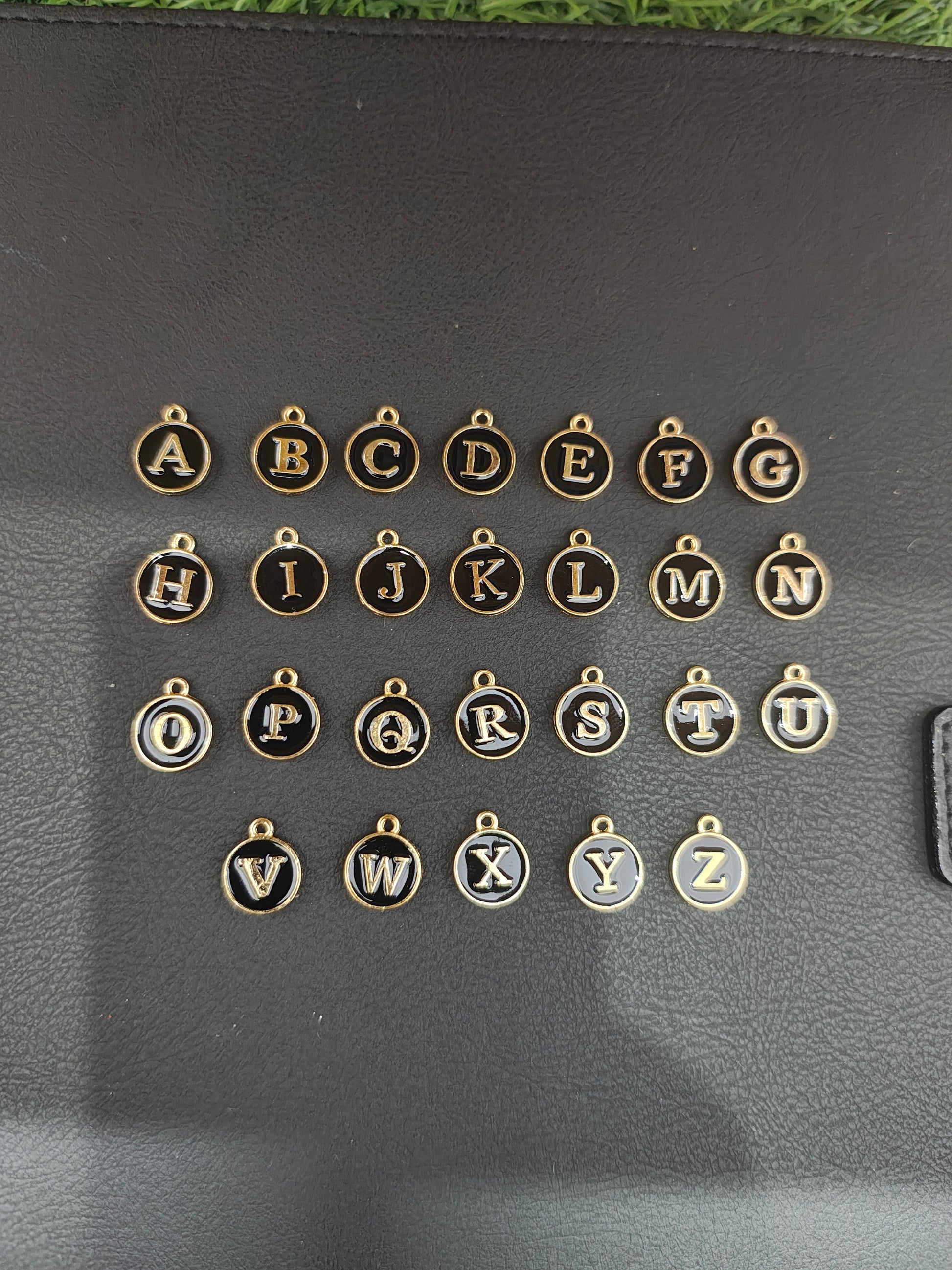 Round black alphabet charm ( atoz set) ( EC1096 )