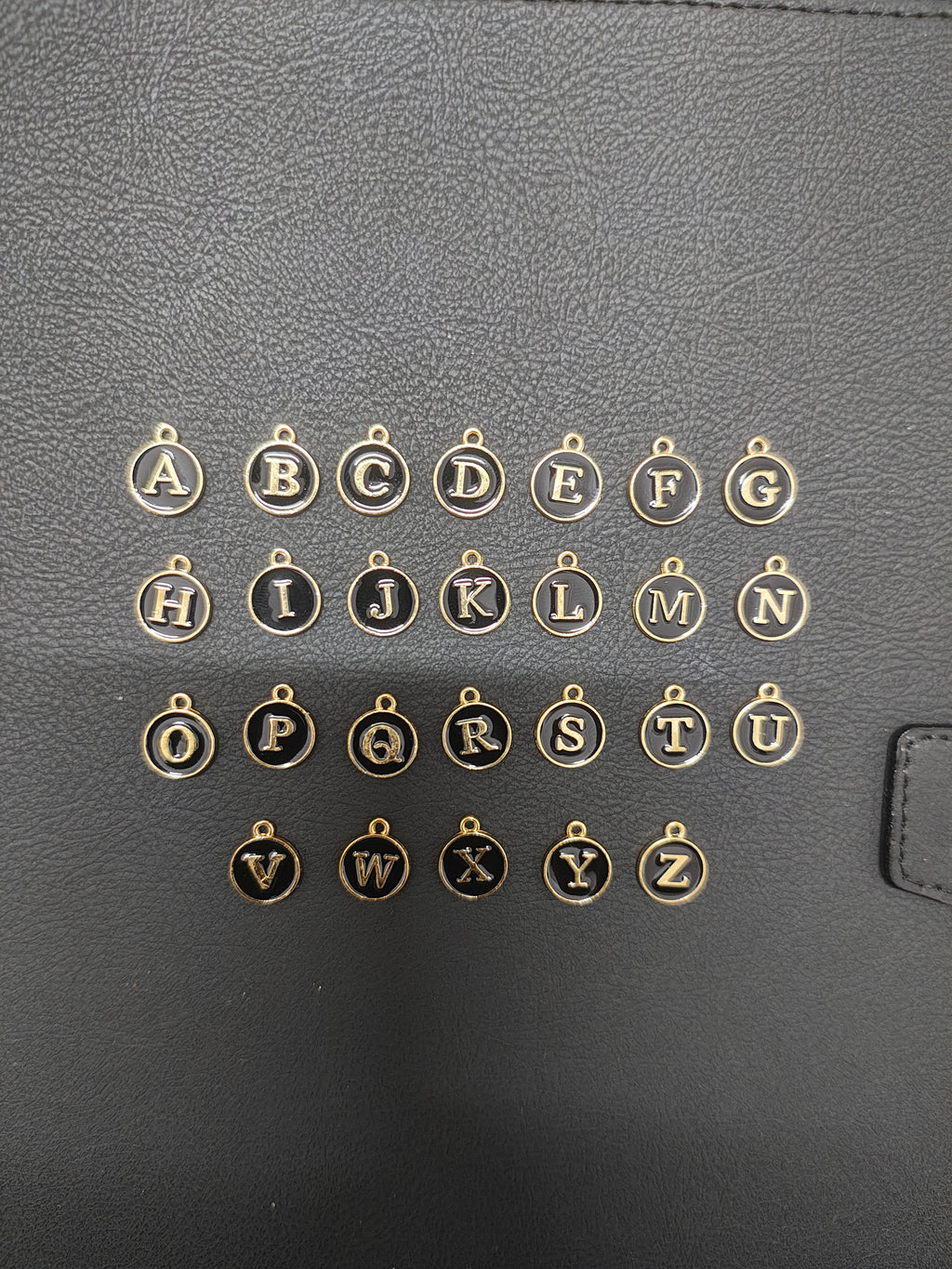 Round black alphabet charm ( atoz set) ( EC1096 )