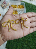 Big golden metal bow charm ( MTC7047 )