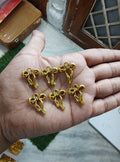 Golden metal bow charm ( MTC7045 )