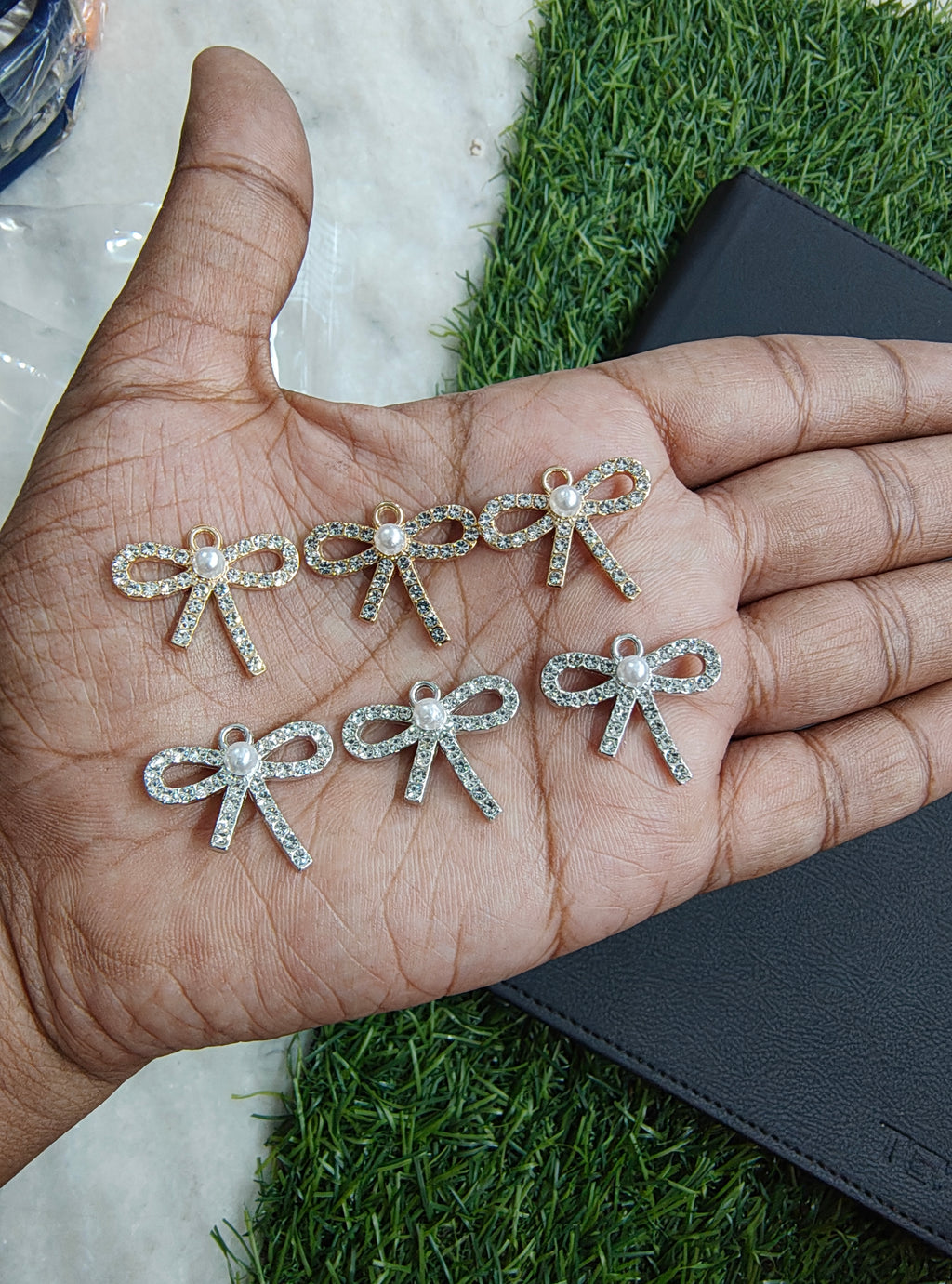 Stone bow charm
