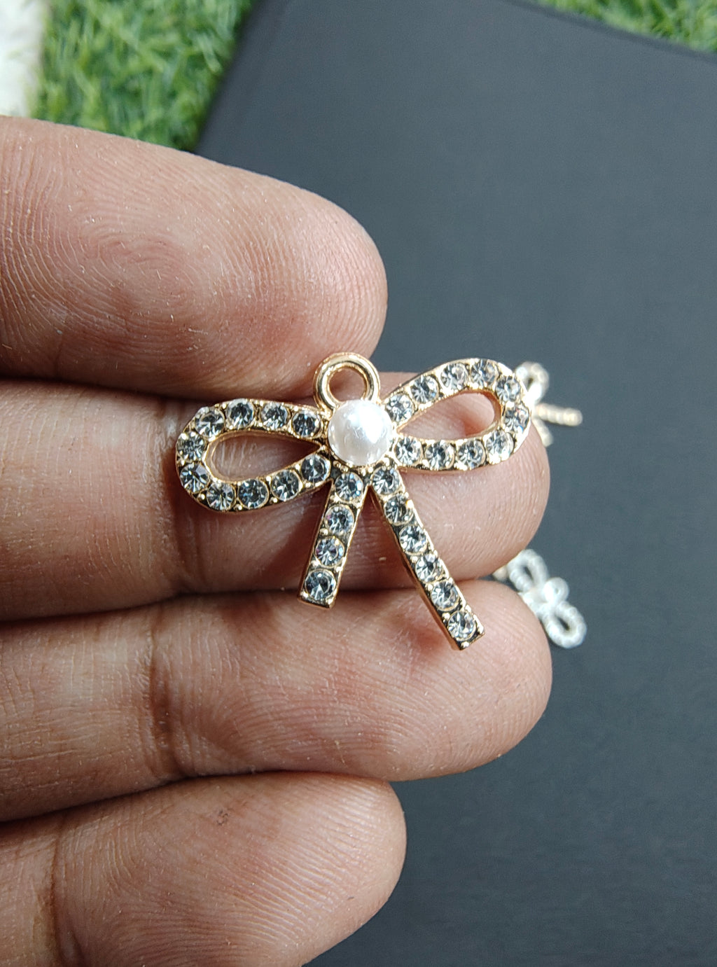 Stone bow charm