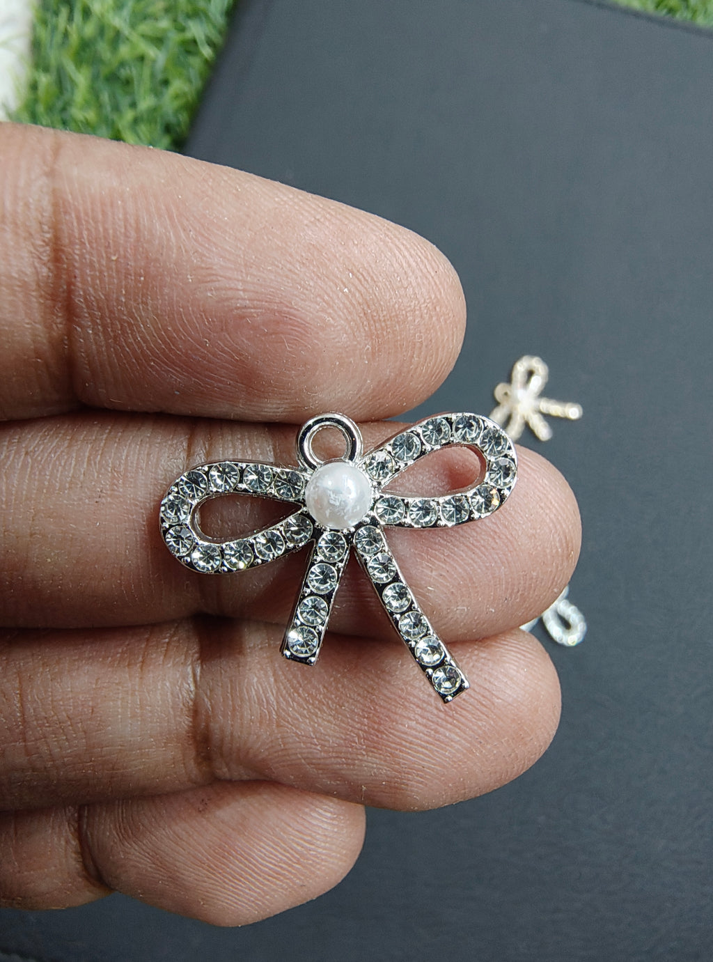 Stone bow charm