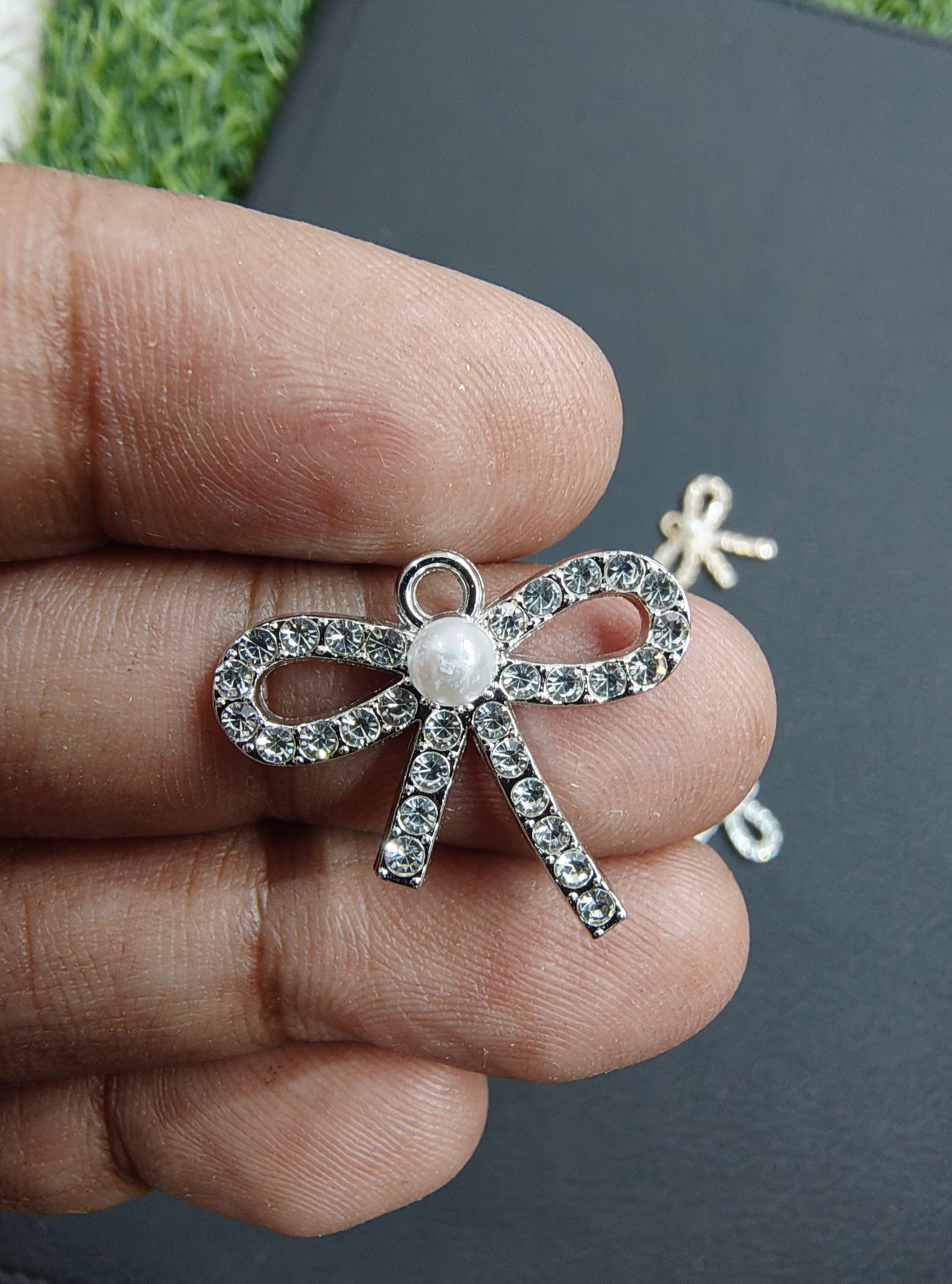 Stone bow charm