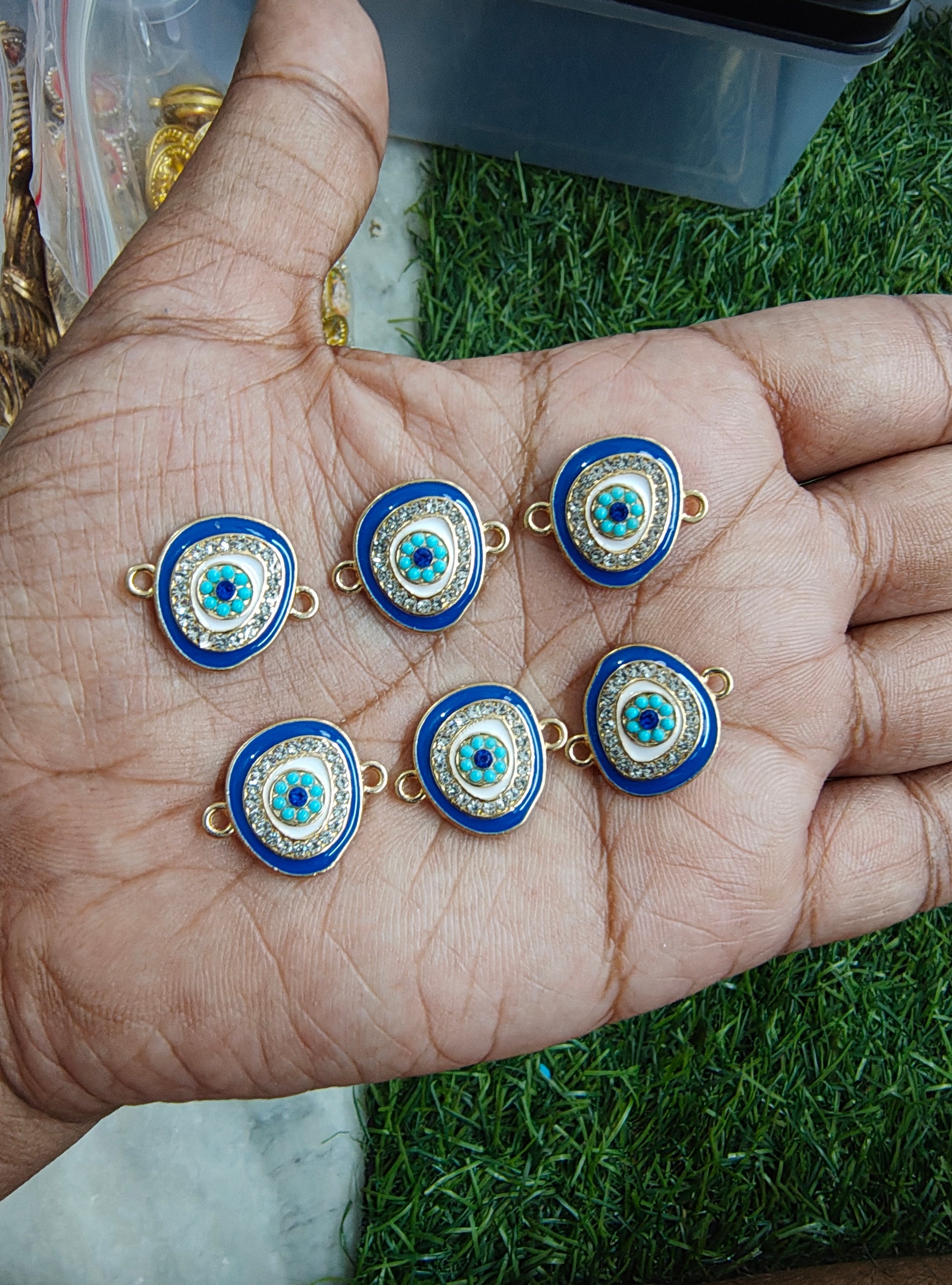 Stone evil eye rakhi charm
