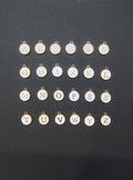 Round white alphabet charm